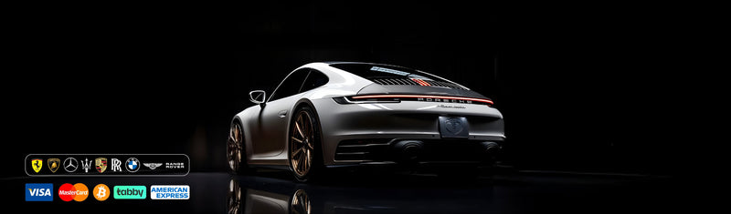 White car on a black background with text and logos.